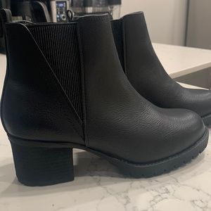 Black Chelsea boots. Brand new, never been worn.